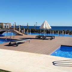 2 bedrooms appartement at San Juan de los Terreros 100 m away from the beach with sea view shared pool and jacuzzi