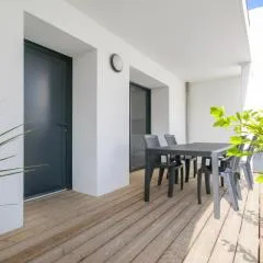 Appartement neuf, 150m de la grande plage, parking, proche commerces