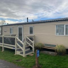 Gold Plus 6 Berth Caravan in NEW BEACH with parking WiFi and decking