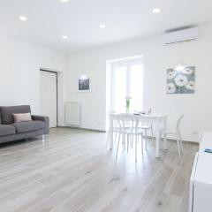 FOUR WHITE APARTMENTS