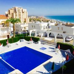 Apartment with pool, sea views & balcony less than 10min walk to La Mata Beach!