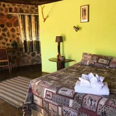 Charming Bush chalet 1 on this world renowned Eco site 40 minutes from Vic Falls Fully catered stay - 1975