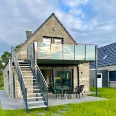 Ferienhaus Panoramadeck am Harkebrügger See mit Sauna und Kamin