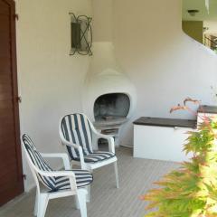 Holiday home with garden and shared pool