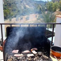 Apartamento casa con vistas al campo y cocina con terraza