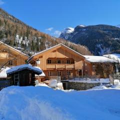 Schlosswirt Chalets & Apartments