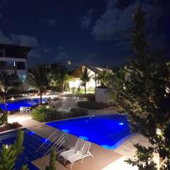 Aconchegante Flat em condomínio na beira mar de Muro Alto - Malawi Beach Resort