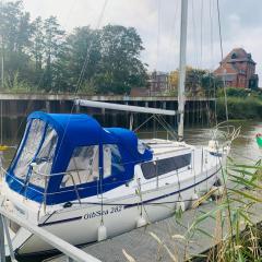 Cosy Sailing Boat Glamping Accommodation on the River in Sandwich