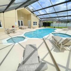 Mickeys Circle - Gorgeous! Modern 6BR, with Private South Facing Pool Hot Tub BBQ Theater 2 Miles to Disney