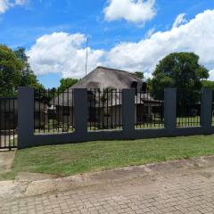 Thatched roof 4 bedroom house air-conditioned