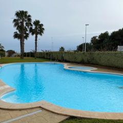 Apartamento con piscina en una preciosa playa