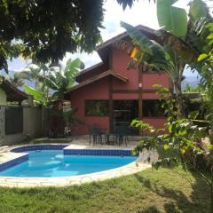 Casa de praia com piscina e clima de montanha