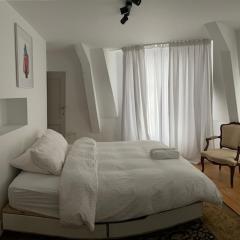 Duplex dernier étage avec terasse à deux pas de la grand place