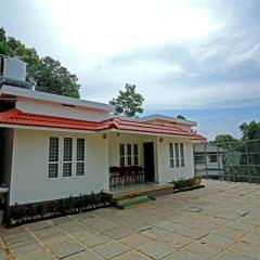 Croods Cottage Wayanad by Lexstays