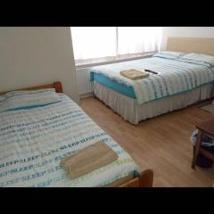 Room in Guest room - Family Room Sleeps 3 with 1 double and 1 single bed Ground Floor Private shower