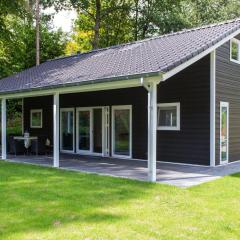Spacious house with covered terrace, located on a holiday park in Rhenen