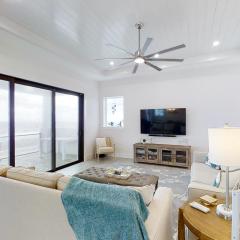 Bask in the sunshine in this new custom home w/ sweeping views of Flagler Beach