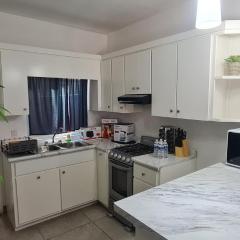 GATED AND VERY SECURED WHITE HOUSE 6 MINS FROM THE BEACH