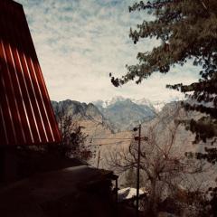 Cottages Amid Mountains