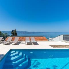 Villa Atopos with heated private pool, 5 bedrooms, Cinema room, panoramic sea views