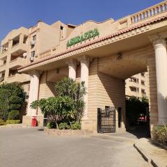 Lovely 2-Bedroom Condo in Compound w Jacuzzi Garden View Wi-Fi, Netflix