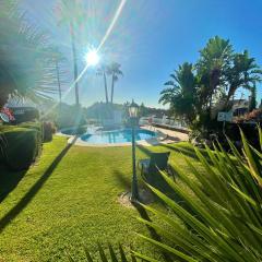 Modern garden apartment with a fantastic sea view and a private garden