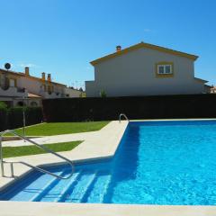Casa en l'Estartit, piscina, jardín comunitario