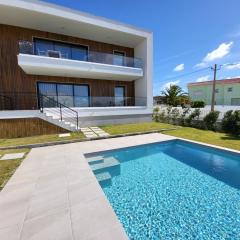 Villa Silver Coast luxe apartment with 3 bedrooms, 2 bathrooms and a beautiful view on the swimmingpool in a cosy Coastvillage between the famous surfplaces Peniche and Nazare