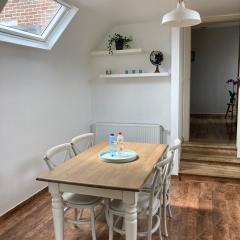 Rustig appartement in het groen met terras