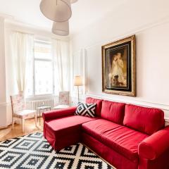 Golden Esthetic with Red Sofa Apartment