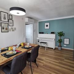 Neues City Center Piano Appartement mit Netflix