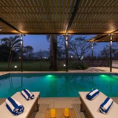 StayVista's Lumiere Villa with Heated Pool, Rainshower Bliss