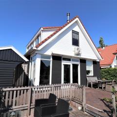 Detached vacation home in Friesland with waterfront views