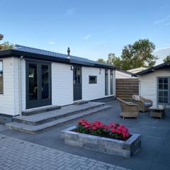 Nice chalet with spacious garden, at a holiday park in Friesland