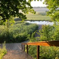 Pustelnia Supraśl - domki nad rzeką