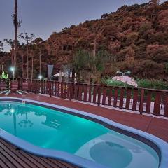 Pousada Jardim do Buda com café e piscina