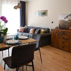 Praktyczny apartament z cichym tarasem