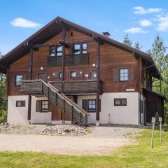 Holiday Home Alppitalo vihertähti 5 apt 2 by Interhome