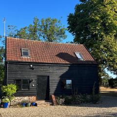 Gorgeous comfortable barn with huge private orchard in quiet Suffolk location