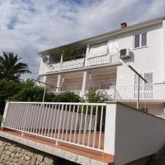 Apartments with parking space Rab - 16359