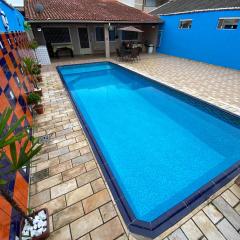 Casa com Piscina e Churrasqueira