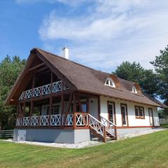 Greyówka dom kryty strzechą w Gardna Park