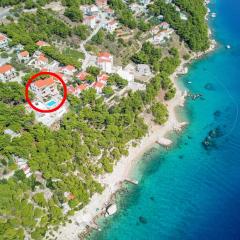 Seaside apartments with a swimming pool Marusici, Omis - 10009