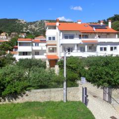 Apartments with parking space Rab - 14792