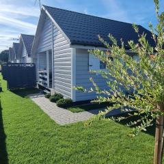 Święty Spokój Rusinowo- domki nad morzem z własnymi ogródkami