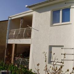 Apartments with a parking space Senj - 16008