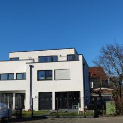 Neue Doppelhaushälfte mit Terrasse, Balkon und Garten