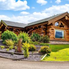 The Log Cabins at The Vu