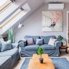 Sunny and Central 3-Bedroom Penthouse with Garage