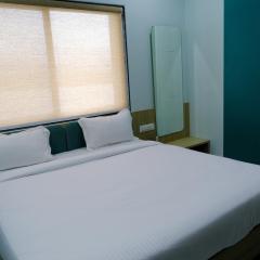 Hotel Sai Unity Room